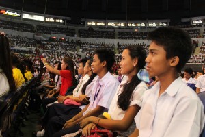 The student-representatives from MiMaRoPa region listen to the keynote speech of President Benigno “Noynoy” Aquino III during the Pantawid Pamilya graduation celebration at Araneta Coliseum. 